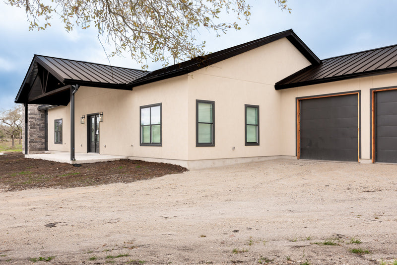The Whiskey Barndominium: A Modern Steel Framed Farmhouse