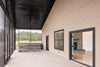 The Whiskey Barndominium: A Modern Steel Framed Farmhouse